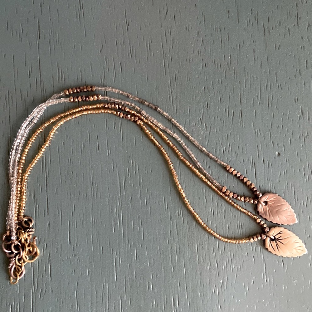 Copper beaded leaf necklaces, from Neiman Marcus